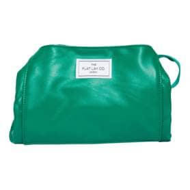 The Flat Lay Co. Open Flat Makeup Bag in Bottle Green Leather Monochrome
